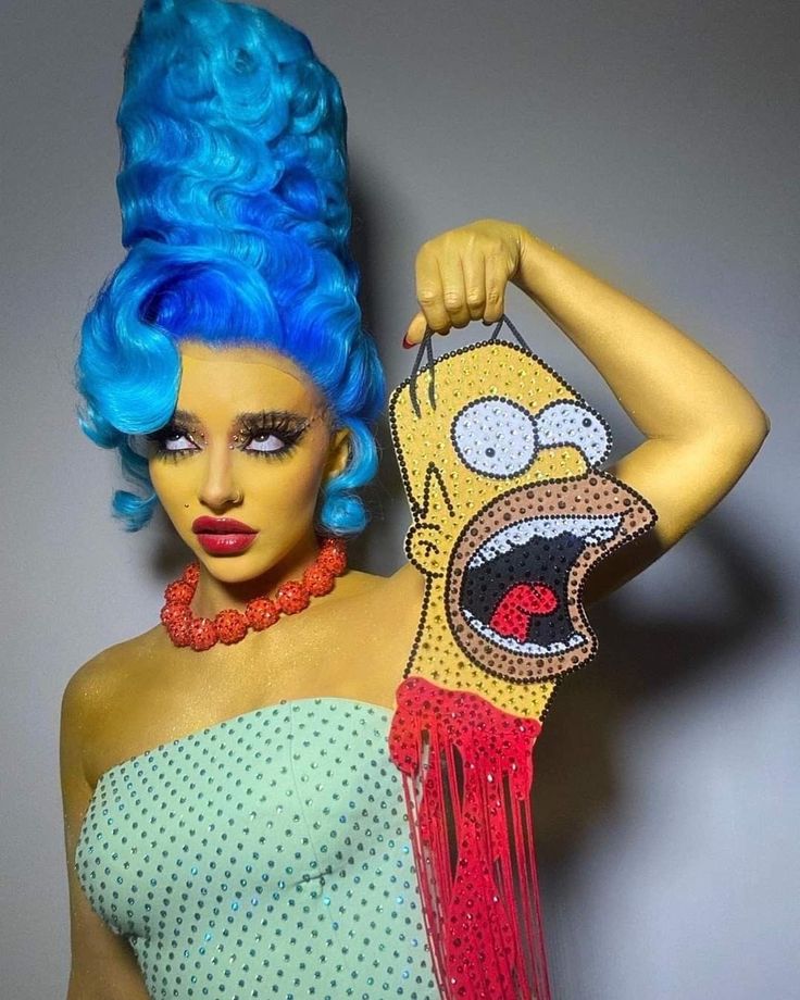 a woman with blue hair and makeup is wearing a simpsons wig while holding a purse