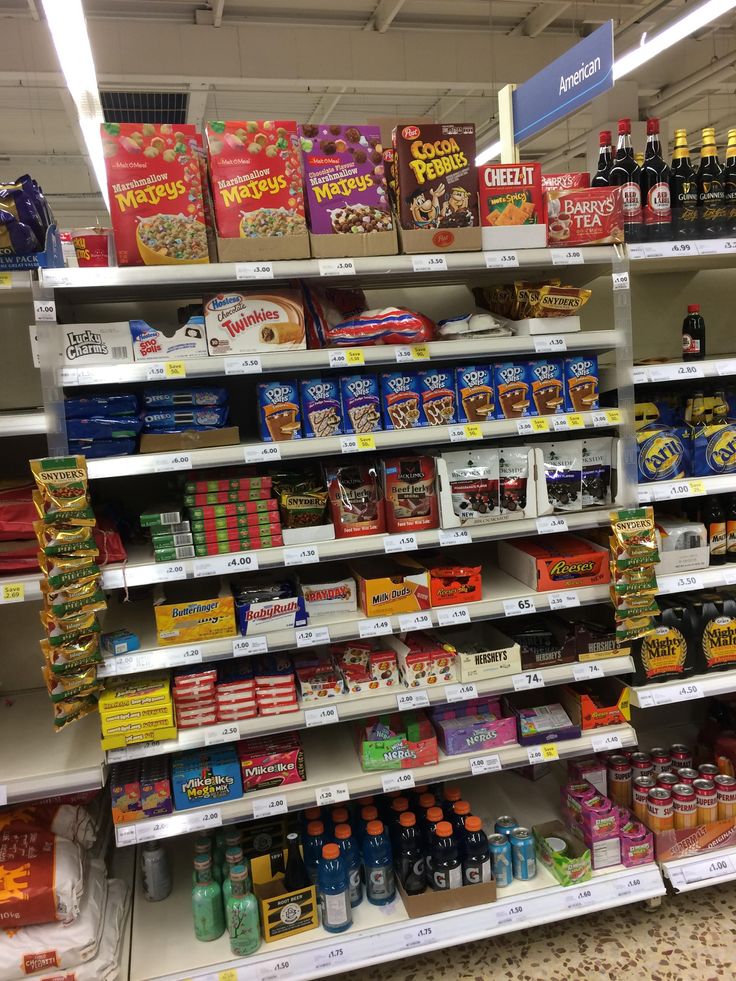 an aisle in a grocery store filled with lots of food