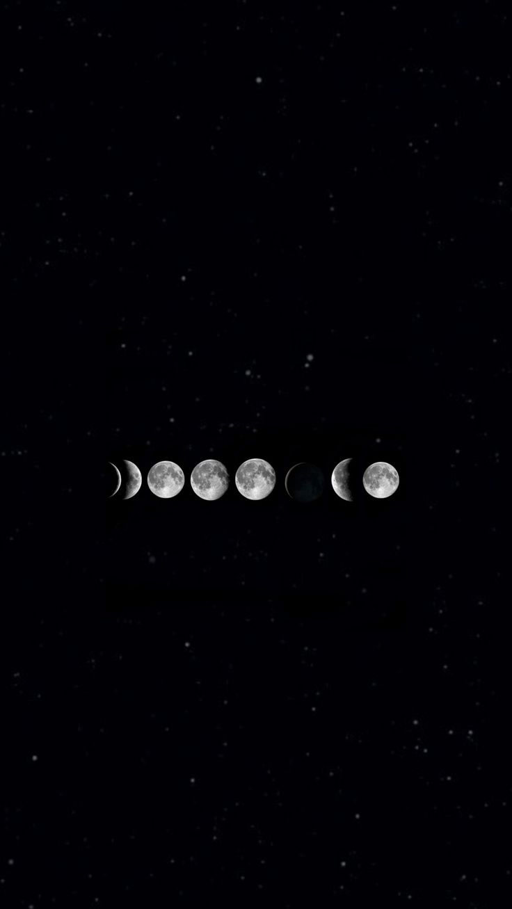 five phases of the moon are shown in this black and white photo with stars around them