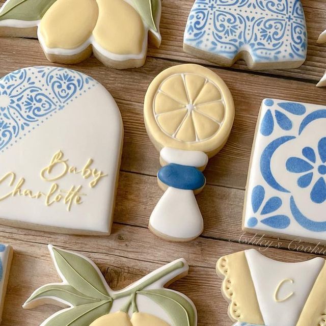 some decorated cookies are sitting on a table