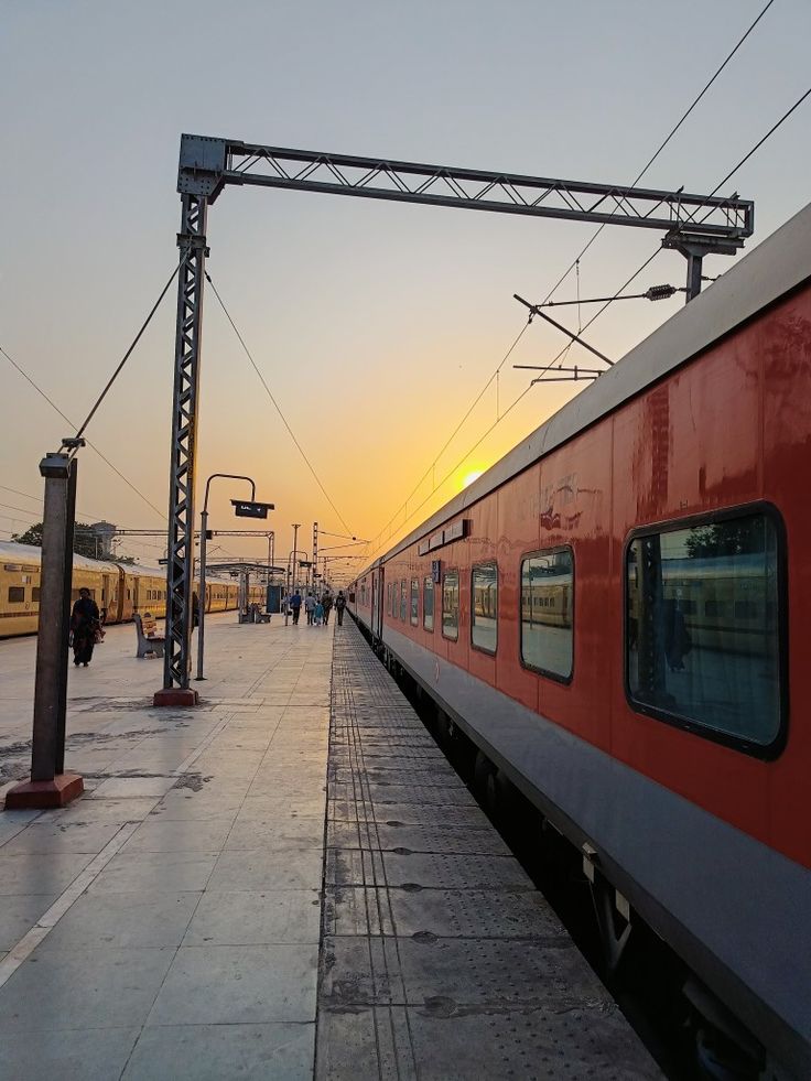 the train is stopped at the station waiting for passengers to get on or off it