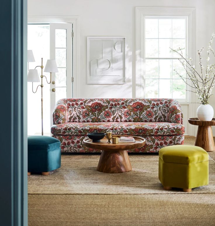 a living room filled with furniture and decor