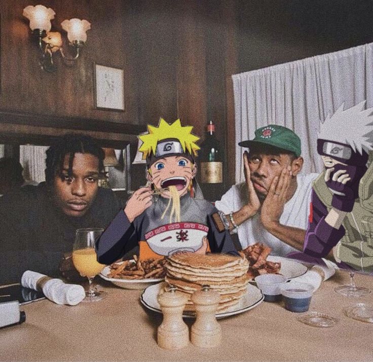 three men sitting at a table with plates of food and drinks in front of them