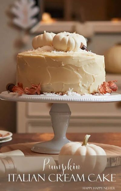 a white cake sitting on top of a wooden table