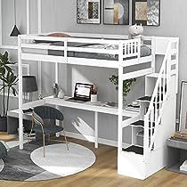 a white loft bed with stairs and desk in the corner, next to a chair