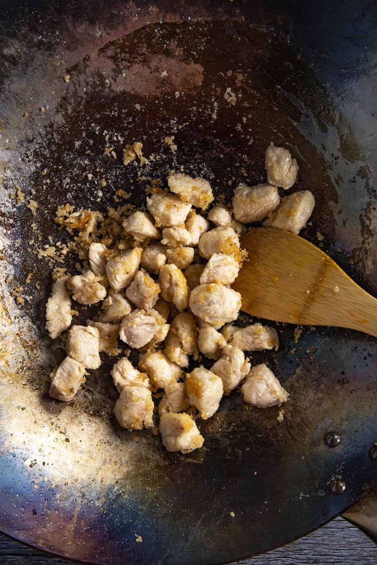 the food is being cooked in the skillet