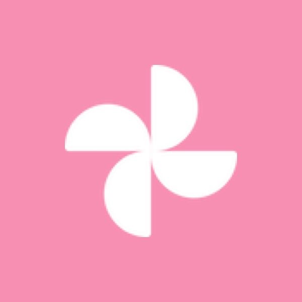 a white flower on a pink background