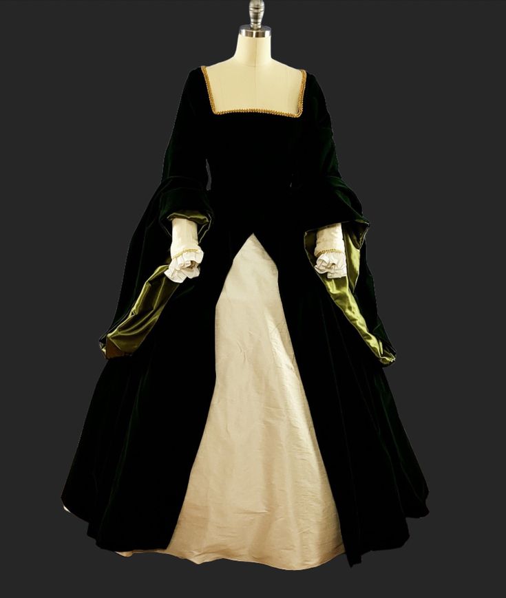 This velvet Tudor ensemble is perfect for your next Ren Faire, Theatre production, Larp, or any other event! Included is the outer gown, underskirt, and fore sleeves. The outer gown is made in a micro-velvet fabric, and laces up in the back for a perfect fit. It is fully lined on the bodice part, and the skirt has clean finished seams. The fore sleeves are removable and made in a complimenting dupioni fabric. Underskirt is full (made with almost 10 yards of fabric!) and has a felt lining for the