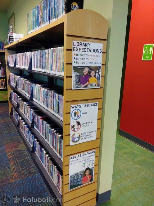 a library filled with lots of books and dvds