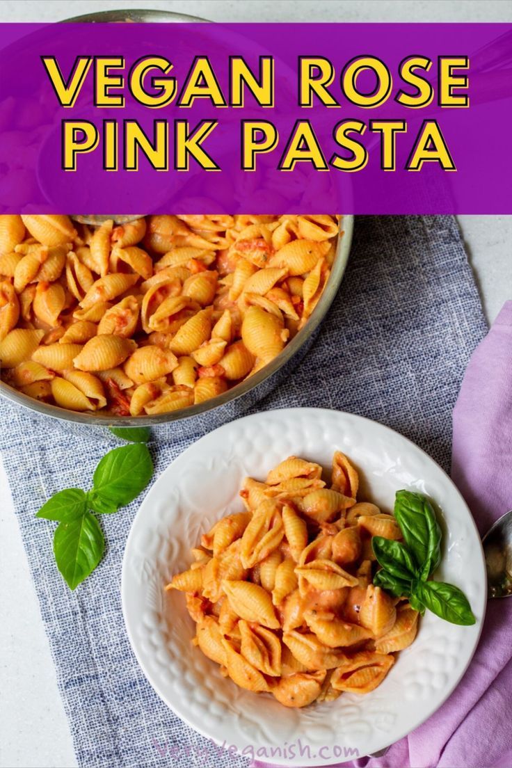 vegan rose pink pasta on a white plate with basil leaves and purple napkins