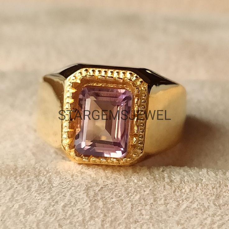 Buyer Must BE Reads All  Details About The Product . Material 925 Sterling Silver . Band Color  Gold . Gemstone Amethyst . Gemstone Colour Purple . Gemstone Size . Gemstone Shape Cushion . Cut Grade Faceted . Birthstone  February . Style  Art Deco . Ring  Mens And Boys Classic Yellow Gold Rectangular Amethyst Ring, Gold Rectangular Amethyst Ring For Formal Occasions, Luxury Gold Emerald Cut Amethyst Ring, Gold Amethyst Ring With Polished Finish For Wedding, Gold Amethyst Ring For Wedding With Polished Finish, Yellow Gold Rectangular Amethyst Ring For Anniversary, Yellow Gold Amethyst Ring For Anniversary, Gold Amethyst Ring With Rectangular Shape, Gold Amethyst Ring With Polished Finish For Promise