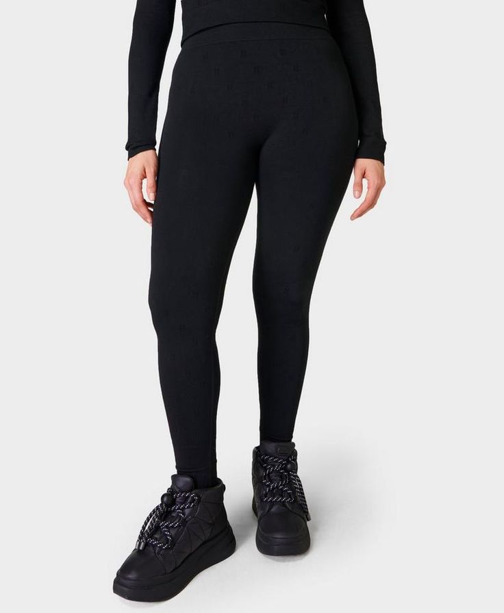 Our high-performance base layer leggings for on or off the slopes. Sweat-wicking fabric with an anti-bacterial finish. High waisted design with a ribbed waistband. Seamless design for no chafing and ultimate comfort. Great for running, hiking and outdoor winter workouts. Inseam length: 27" / 68cm. Model wears size S and is 178cm/5'10" tall. Style Code: SB6853Colour: Black Compressive Moisture-wicking Elastane Leggings, Compressive Full Length Moisture-wicking Leggings, Compressive Moisture-wicking Full-length Leggings, Womens Ski Outfits, Compressive Outdoor Leggings With Moisture-wicking, Black Compression Leggings, Sweat Resistant, Winter Workout, Black Seamless, Skiing Outfit