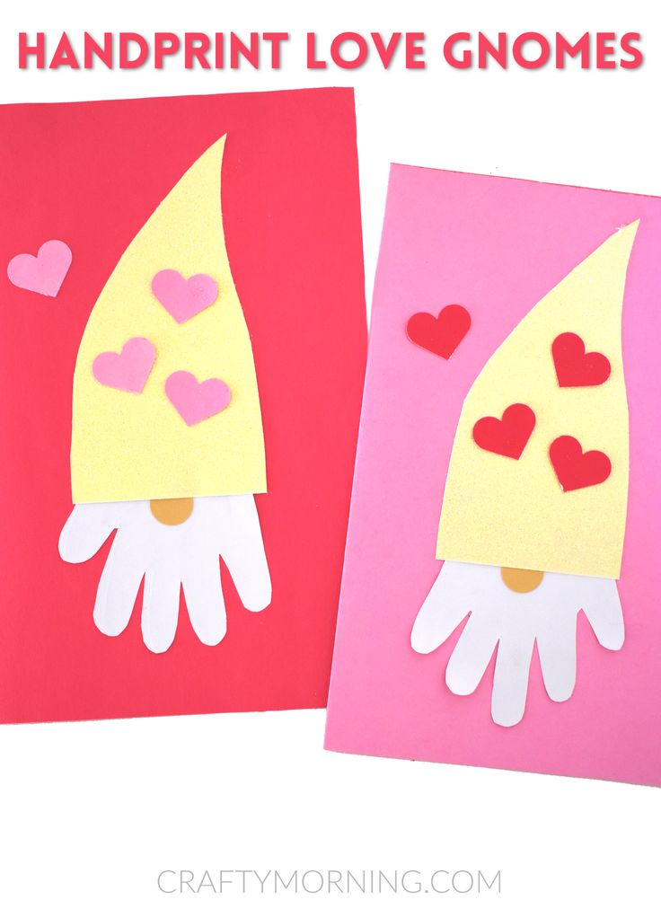 two handprinted valentine's day cards with paper hearts on them, one is holding