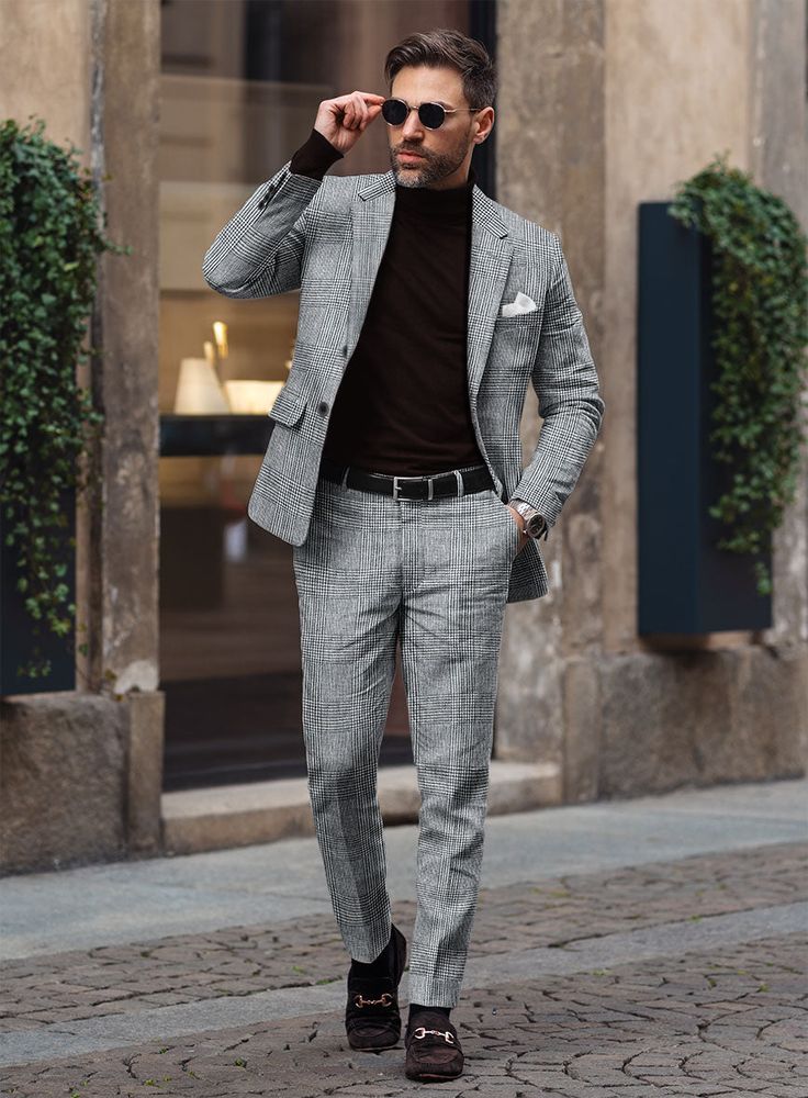 Emerge as the cynosure of all eyes by donning our Italian Linen Tovia Suit. Exquisitely tailored from the finest pure linen, this suit features a sophisticated blue-gray hue adorned with a subtle plaid motif, seamlessly blending classic elegance with a touch of modern flair. It offers both a distinguished appearance and exceptional comfort, making it ideal for any occasion where standing out is essential. Whether you're asserting a commanding presence or exuding effortless sophistication, this suit guarantees you will captivate the room with grace and confidence.   Look features a 2 button jacket with notch lapels, horn royal black buttons, single vent, three cuff buttons and two welted back pockets on trousers.   Click 'Customize Now' to modify the look if needed.   Lining: Viscose. Timeless Linen Formal Suits, Timeless Linen Suit For Formal Occasions, Timeless Formal Linen Suit, Timeless Linen Suit, Classic Linen Suits For Office, Single-breasted Linen Suits For Office, Single Breasted Linen Office Suit, Linen Single-breasted Suits For Office, Timeless Linen Single-breasted Suit