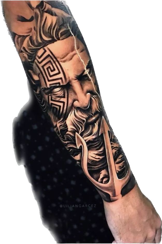 a man's arm with tattoos on it and an image of a bearded man