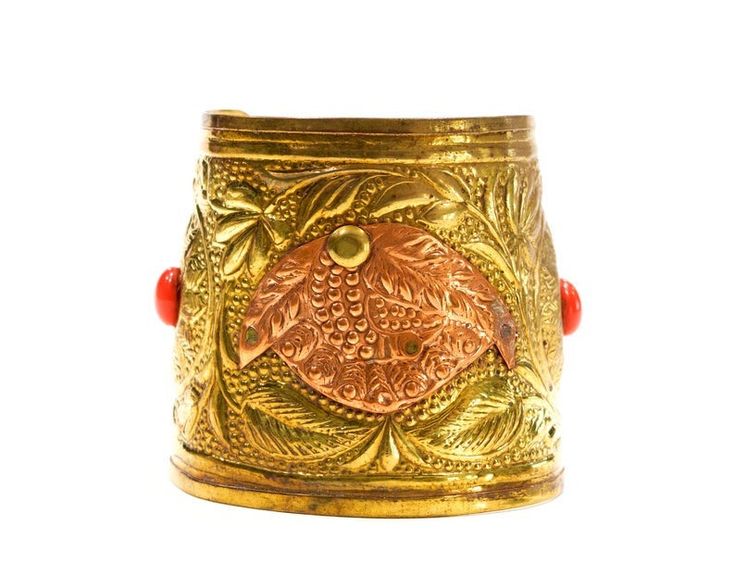 "Simply amazing boho cuff bracelet with an intricate design. Made of embossed brass, copper and two orange glass cabochons. New old stock, originally from the 1970s. Most with original sicker. Although new and never used, age has added oxidation spots, tarnish and unique character. Measures approximately 2 5/8\" at widest point, inside diameter, can be adjusted by simply flexing the cuff. NOTE: The beauty of all ethnic jewelry comes from its distinct rustic feel. There are unique variations in c Handmade Bangle For Festive Occasions, Red Vintage Bracelets For Festivals, Vintage Red Bracelets For Festival, Bohemian Wedding Cuff Bracelet, Bohemian Cuff Bracelet For Weddings, Bohemian Bangle With Intricate Design For Festivals, Festive Bohemian Wedding Cuff Bracelet, Handmade Festival Bracelets, Handmade Bracelets For Festivals