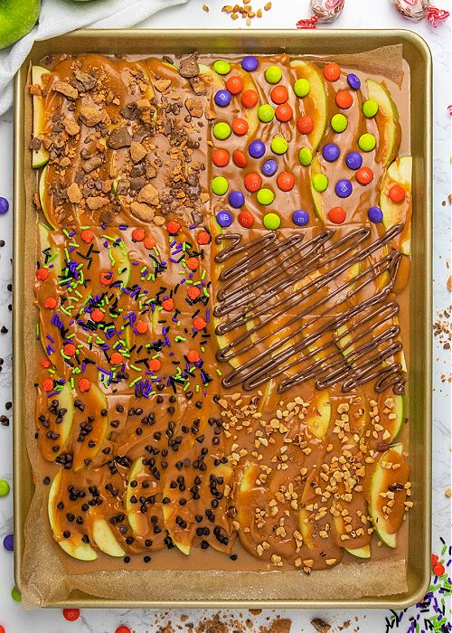 a tray filled with lots of different types of desserts