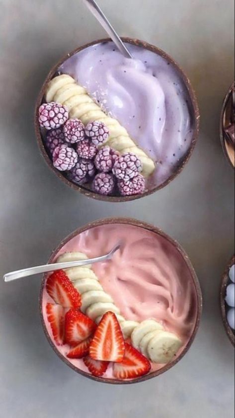 three bowls filled with different types of fruit and yogurt on top of each other