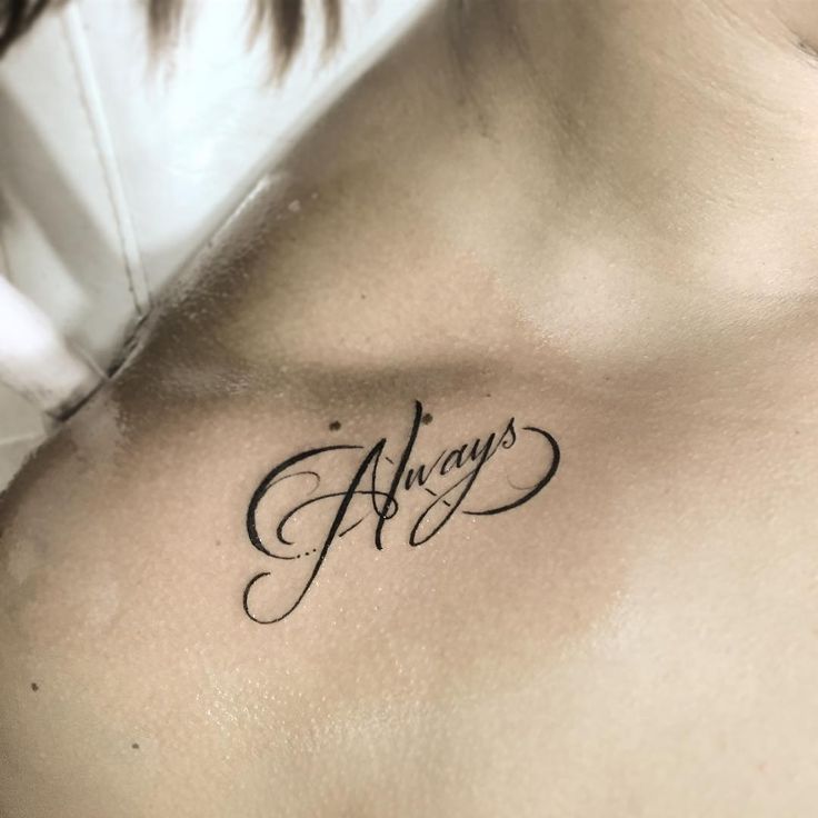 a woman's chest with the word always tattooed on her left side ribcage