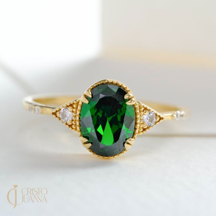 "Here is 14K Gold Emerald Diamond Ring,! This 18K Oval Birthstone Ring will be perfect 10K Customized Birth Stone Band for her, mother, grandmother or wife! We can create birthston moissanite with her anniversary or birthday night ceremony. This emerald diamond ring will be best gift for your wife or mother as well! This shiny solitaire ring is great shower ring with stunning and Dainty Birth Stone. This emerald ring gifted and oval birthstone ring will be either special night shower ring! Birth Gia Certified Oval Diamond Ring For Gift, Gift Emerald Ring With Oval Cabochon Halo Setting, Gia Certified Oval Cabochon Jewelry Gift, Gia Certified Oval Diamond Ring In 14k Gold, Oval May Birthstone Ring With Halo Setting, Oval Halo Setting Birthstone Ring For May, Oval Emerald Birthstone Ring In Yellow Gold, Oval Halo Setting May Birthstone Ring, Oval Gold Emerald Ring With Halo Setting