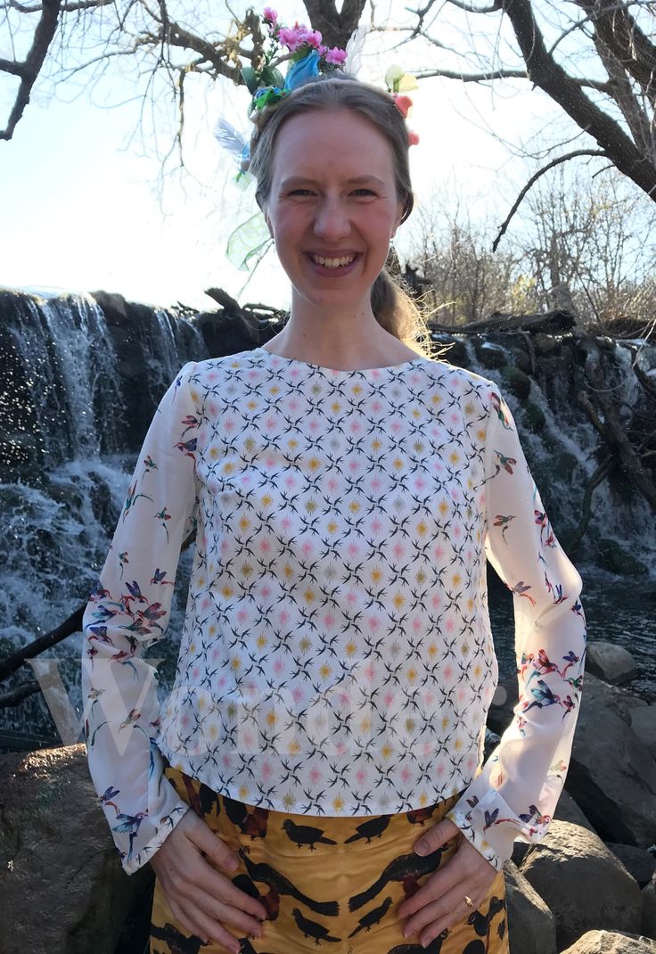 This is a classic blouse in a feminine design. The sleeves are transparent and give the blouse a flirty touch. The back is decorated with a small opening and closed with a button. #birdpatternedblouse #gotscertifiedorganiccottonblouse #organiccottonblouse #summerblouse #womenblouse #sustainableblouse #ecofriendlyblouse #designerblouse #ecofriendlywomenfashion #sustainablewomenfashion #ecofriendlyfashionbrand Chic Blouse With Sheer Sleeves For Spring, Summer Tops With Sheer Long Sleeves, Spring Blouse With Sheer Flowy Sleeves, Spring Blouse With Sheer Sleeves And Flowy Fit, Long Sleeve Tops With Sheer Sleeves For Summer, Fitted Long Sleeve Top With Blouson Sleeves For Spring, Feminine Stretch Blouse For Day Out, Stretch Feminine Blouse For Day Out, Sheer Long Sleeve Top For Day Out