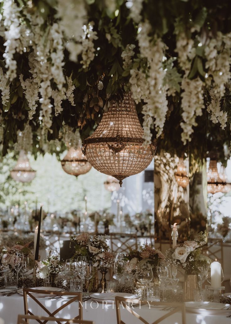 Hanging foliage with pops of white wisteria created a breathtaking setting for guests entering the marquee. Amaze your guests with the help of Moriarty Events! Hanging Foliage, Floral Tablescape, Wisteria Wedding, Wedding Pool Party, Pool Wedding, White Wisteria, Live Set, Pretty Party, The Perfect Day