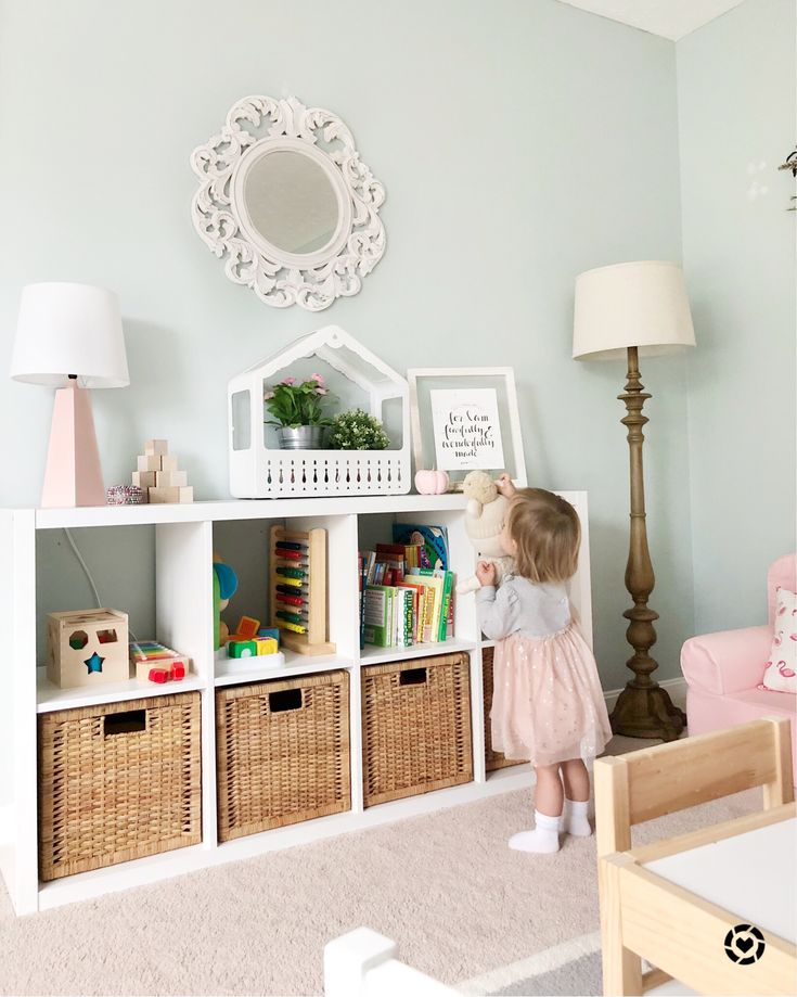 IKEA kallax with wicker bins, sw copen blue paint, pops of pinks and feminine playroom Sw Copen Blue, Kallax Kids Room, Copen Blue, Ikea Kids, Ikea Bedroom, Ikea Kallax, Playroom Organization, Kallax Ikea, Toddler Bedrooms