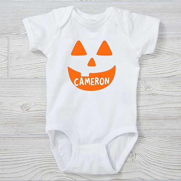 * Personalized with any name * Choice of Jack-o'-Lantern character and colors  * Features double-needle ribbed binding on neck, shoulders, sleeves and legs * Reinforced 3 snap closure * Available in infant 6 months - 18 months * 100% combed ring-spun cotton jersey * Machine wash, tumble dry * Not intended for sleepwear * Imported Our Jack-o'-Lantern Personalized Halloween Baby Clothing will make for great pictures at the pumpkin patch or Halloween parties. Outfit your entire family in our Skelet Fall Playtime Fitted Bodysuit, Fitted Bodysuit For Playtime In Fall, White Onesie Halloween Costume, Fitted White Onesie For Fall, Fitted White Bodysuit With Character Print, White Bodysuit For Halloween Costume Party, Cute White Bodysuit For Halloween, Parties Outfit, Halloween Baby Clothes