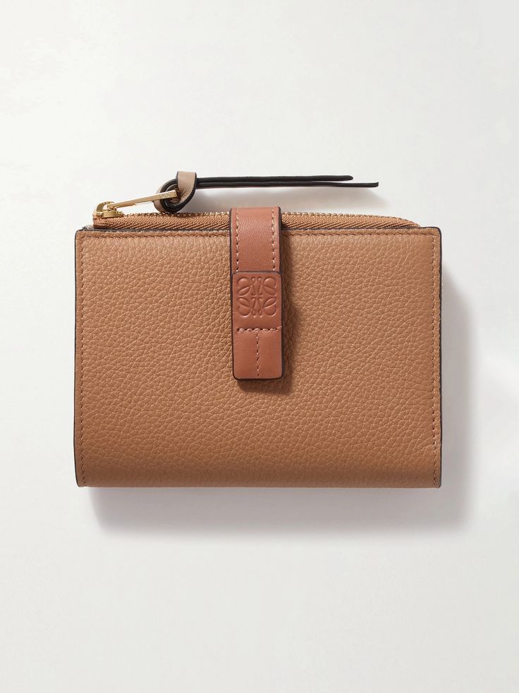 Loewe's wallet comes in muted shades of 'Light Caramel' and 'Pecan'. Crafted from textured and smooth leather, the bi-fold design unzips to reveal multiple slots for your credit cards and slip pockets for notes and receipts, all secured by a logo-embossed strap. Slip it into one of the label's 'Puzzle' bags. Matching Separates, Jo Malone London, Card Holder Wallet, Ski Wear, Credit Cards, Jeans Dress, Smooth Leather, Women Collection, Leather Wallet