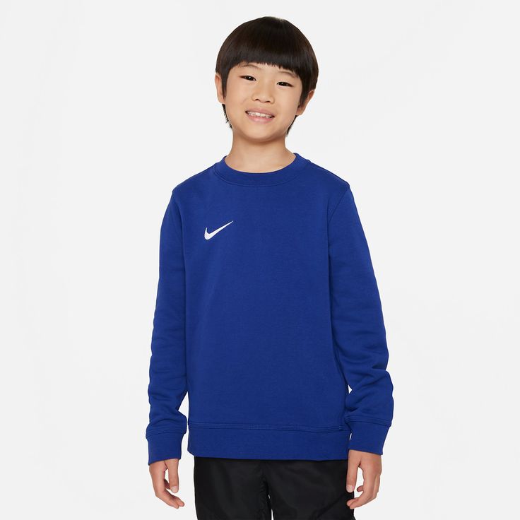 Nike Barcelona Youth Long Sleeve Crew 23/24. For cheering your team on cool weather game days. Soft and lightweight comfort with French terry fabric. Ribbed cuffs and hem. "Som Un Equip" (We Are A Team) shows your love for the Blaugrana. 80/20 Cotton/polyester. Nike Fleece Activewear For Sports Events, Sporty Solid Color Sweatshirt For Sports Season, Team-colored Sportswear Sweatshirt For Fan Gear, Team-colored Sweatshirt For Fan Gear, Cotton Sports Sweats With Ribbed Cuffs, Cotton Sweats With Ribbed Cuffs For Sports, Sportswear Sweatshirt With Team Logo For Fans, Sportswear Sweatshirt With Team Logo, Team Logo Sweatshirt For Fan Gear