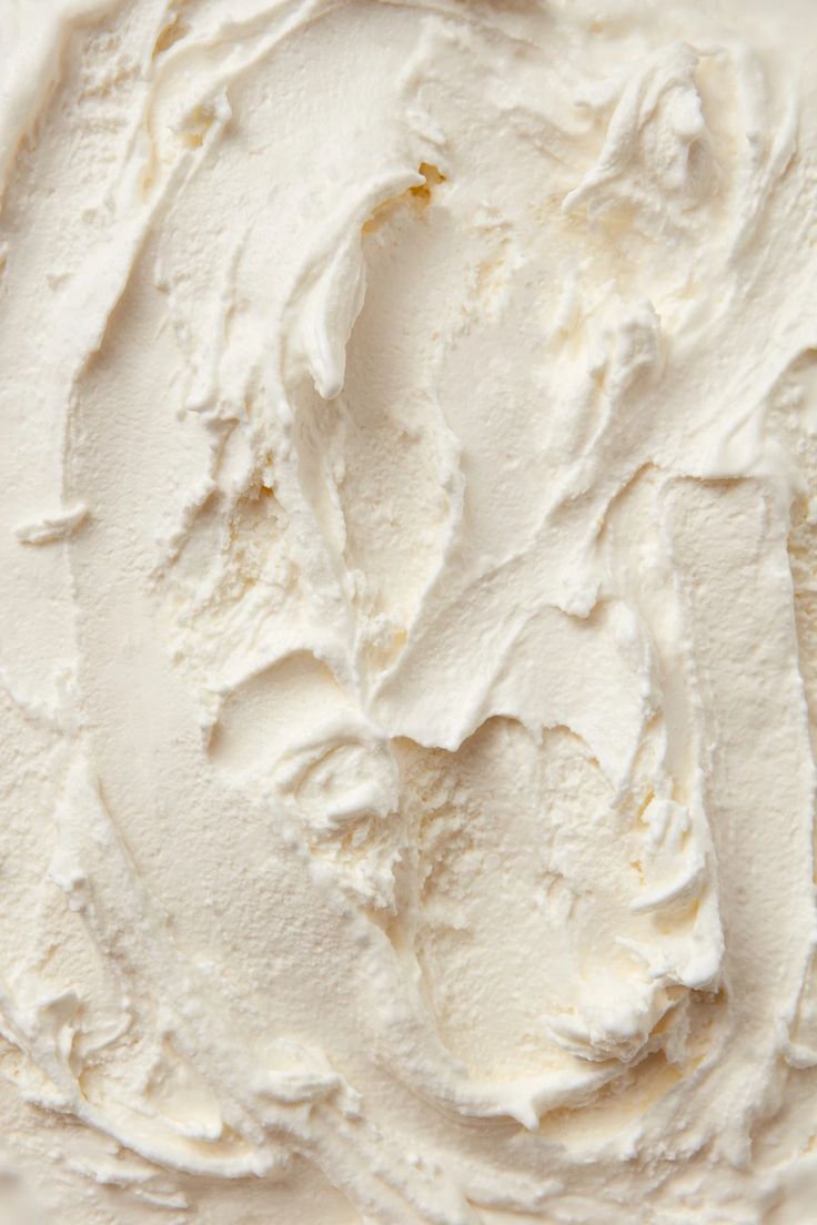 a close up view of some white frosting