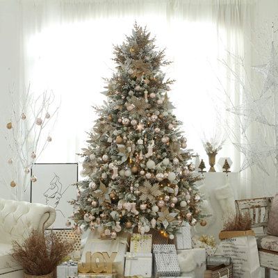 a decorated christmas tree in a living room