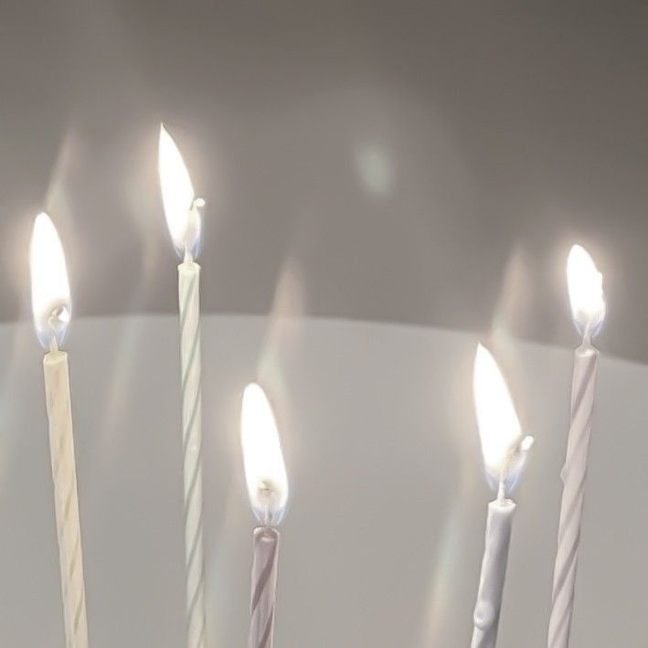 five candles with white and pink lights are arranged in a row