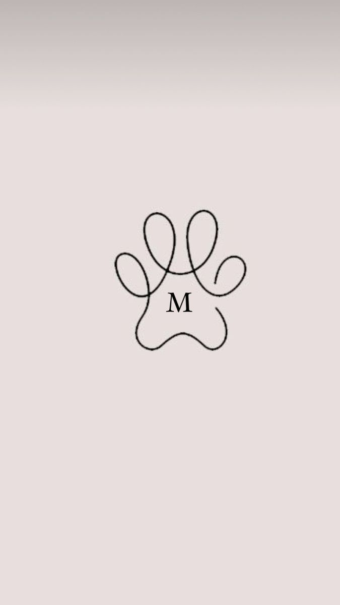 a dog's paw with the letter m on it