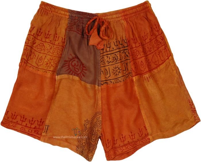 A fun pair of handmade cotton patchwork shorts, these soft cotton orange shorts with hippie prints are a perfect match for a day full of frolic! The summer shorts feature a pocket on either side for your essentials.  It`s made of cotton fabric in a patchwork of slightly different shades of orange and is also lined with a soft cotton layer to give it some body. #tlb #bohemianfashion #Handmade #HippieShorts #BeachShorts Orange Cotton Bottoms For Festival, Orange Cotton Festival Bottoms, Hippie Orange Bottoms For Summer, Summer Hippie Orange Bottoms, Summer Orange Patchwork Bottoms, Brown Bohemian Shorts, Bohemian Brown Shorts For Summer, Brown Bohemian Shorts For Summer, Hippie Cotton Short Bottoms