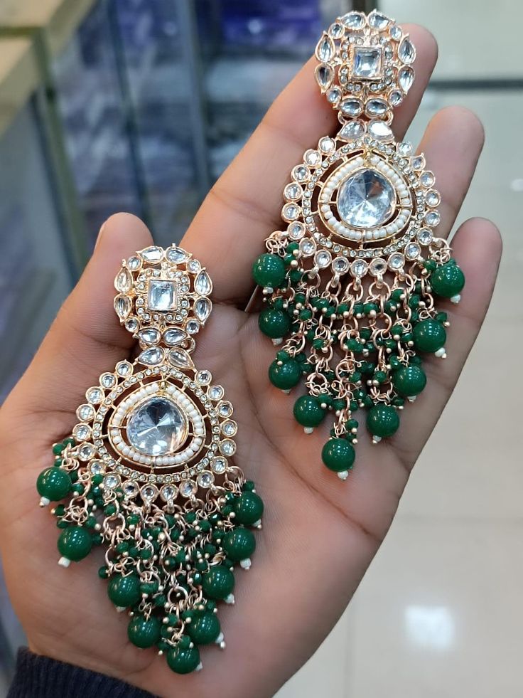 Enhance your bridal look with these fine Kundan Chandbali earrings. Designed to make a statement, these ethnic Indian jewelry pieces are perfect for adding elegance and sophistication to your wedding attire.  Premium Kundan Statement Earrings Bollywood High Quality Jewelry: Make a glamorous statement with these premium Kundan earrings, inspired by Bollywood fashion. High-quality craftsmanship ensures these statement earrings offer exceptional beauty and durability. Perfect for any special occasi Diy Kundan Earrings, Kundan Chandbali, Pakistani Earrings, Bridal Earrings Chandelier, Long Chandelier, Polki Earrings, Jewelry Set Design, Chandbali Earrings, Earrings Indian