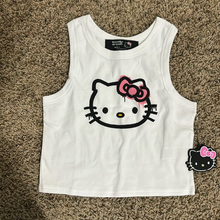 Brand New Never Worn Tag Still Attached Pit To Pit: 14” Length: 14” Feel Free To Send Me An Offer! I Will Ship Out The Same Or Next Day Of Purchase! (: White Y2k Cat Print Top, Y2k White Cat Print Top, White Y2k Style Cat Print Top, Cute White Tops With Cat Design, White Fitted Top With Cat Print, Fitted White Cat Print Top, Fitted White Top With Cat Print, White Kawaii Top With Cat Design, Spring White Hello Kitty Top