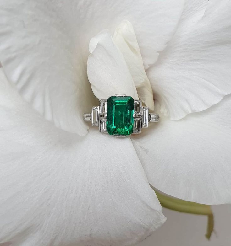 4 CT Green Emerald Cut Side Baguette Cut Multi Stone Engagement Ring 10K 14K 18K Solid White and Rose Gold Wedding Ring Anniversary Ring Bridal Ring R I N G M E T A L ✥ Metal :  925 Sterling Silver, 10K 14K 18K Solid White Yellow and Rose Gold ✥ Metal Clarity : Pure ✥ Stamp/Hallmark : Yes M A I N S T O N E S ✥ Type : Moissanite Diamond ✥ Shape : Emerald Cut ✥ Weight : 4 Ct ✥ Diamond Color : Green ✥ Clarity : VVS1 ✥ Diamond Cut : Excellence S I D E S T O N E S ✥ Type : Moissanite Diamond ✥ Shape : Baguette Cut ✥ Weight :  1.85  Ct ✥ Color : White ✥ Clarity : VVS1 ✥ Cut : Very Good R I N G S I Z E S ✥ All Ring Size are Available ✥ If You Have any Questions With Regards to Sizing Please Contact as S H I P P I N G ✥ Free Express Delivery ✥ No Extra Charge For Delivery  ✥ Fastest  Delivery Avai Art Deco Emerald Ring In Baguette Cut White Gold, Classic Rectangular Emerald Wedding Ring, Classic Wedding Emerald Cut Emerald Ring, Classic Emerald Ring With Baguette Diamonds For Anniversary, Classic Emerald Ring With Baguette Diamonds For Wedding, Wedding Baguette Cut White Gold Emerald Ring, Wedding White Gold Emerald Ring Baguette Cut, Baguette Cut Emerald Ring For Anniversary, Rectangular Emerald Ring In White Gold For Wedding