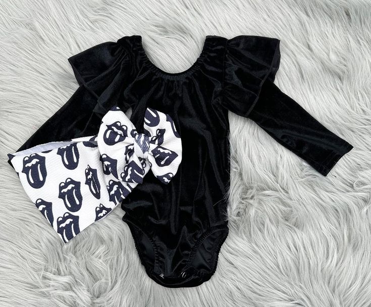 We suggest pairing this bodysuit with our Peace, Love, Rock bow! Fitted Black Onesie For Playtime, Black Fitted Onesie For Playtime, Cute Fitted Onesie For Party, Playful Fitted Black Onesie, Cute Fitted Party Onesie, Black Fitted Playful Onesie, Fitted Black Onesie For Playwear, Black Playful Bodysuit For Casual Wear, Fitted Black Onesie For Summer