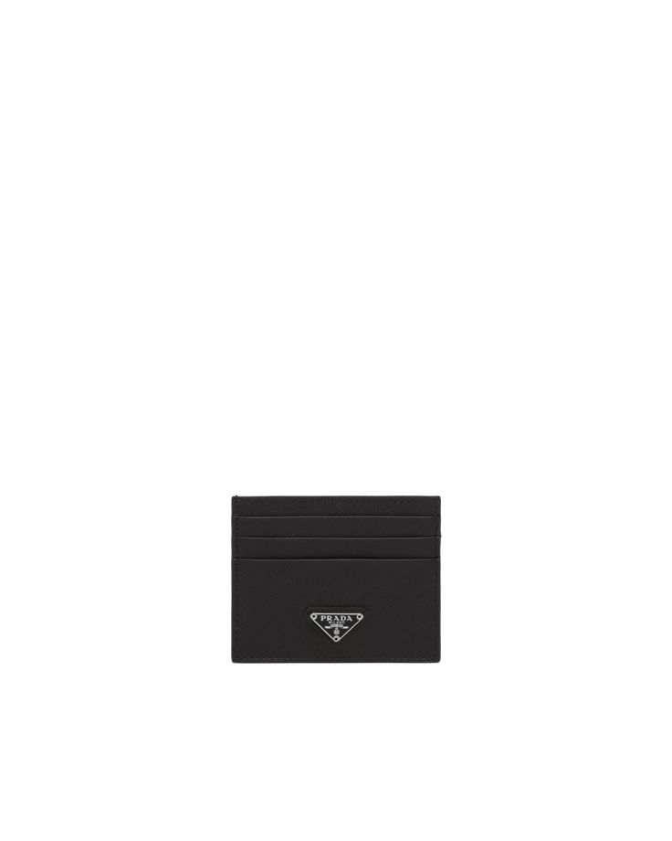 The unmistakable texture of Saffiano leather characterizes this sleek card holder. The accessory with six card slots is decorated with a tonal enameled metal triangle logo. Ysl Wallet, Prada Mini, Beauty Brushes, Mens Holiday, Mens Travel, Prada Saffiano, Leather Card Holder, Prada Leather, Triangle Logo