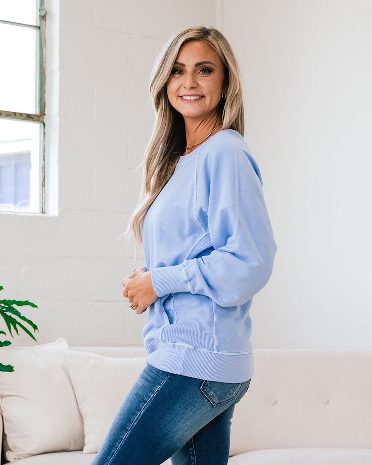 Girlfriend Crewneck Sweatshirt - Spring Blue Spring blue Crewneck Side pockets Ribbed details Good stretch Body: 100% Cotton Ribbing: 95% Cotton 5% Spandex Imported General Sizing: Small (0-4), Medium (6-8), Large (10-12), XLarge (14-16)True to sizeModel is wearing a size Small Measurements: Small: Bust: 22" // Length: 26" Medium: Bust: 22.5" // Length: 26.5" Large: Bust: 23" // Length: 27" XLarge: Bust: 23.5" // Length: 27.5" Bust measurements are taken across the chest laying flat.Length measu Spring Washed Blue Relaxed Fit Sweatshirt, Relaxed Fit Light Blue Long Sleeve Sweatshirt, Light Blue Long Sleeve Relaxed Fit Sweatshirt, Soft-washed Blue Sweatshirt For Spring, Light Wash Relaxed Fit Long Sleeve Tops, Light Wash Long Sleeve Relaxed Fit Tops, Light Wash Relaxed Fit Top For Fall, Light Wash Tops With Relaxed Fit For Fall, Long Sleeve Soft-washed Sweatshirt In Washed Blue