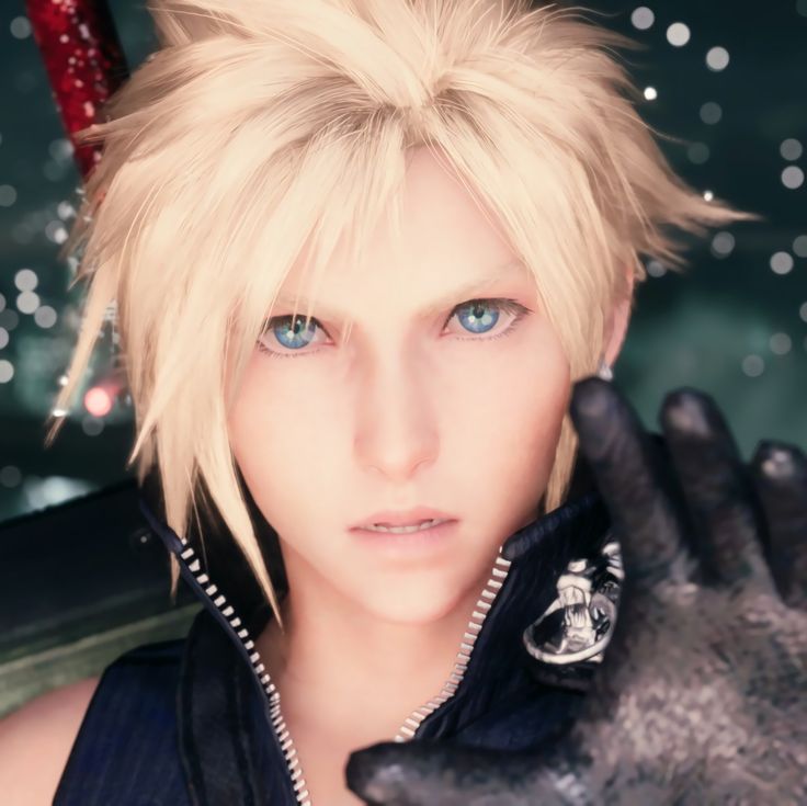 an anime character with blonde hair and blue eyes holding his hand up to the camera