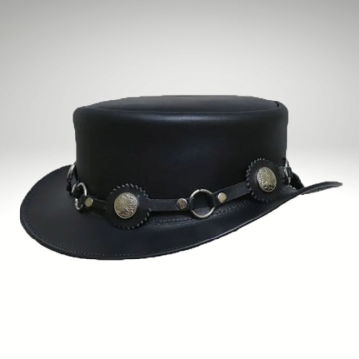 Black Short Top Hat is made from genuine leather and is perfect for keeping you cool and comfortable.  We have designed the sleek and streamlined Black Leather Top Hat to be perfect for those who prefer a simpler look.  Cowhide suede, a narrow self-leather hat strap adorns the short pointed crown. Its wide edges flare up from the sides. This product is handmade with cowhide leather and is produced by experienced craftsmen.  This product is both stylish and durable. Our products are of the highes Steampunk Coffee Table, Custom Suits Men, Boho Men Style, Leather Top Hat, Personal Stamp, Black Leather Top, Mens Hats, Custom Suits, Leather Hat