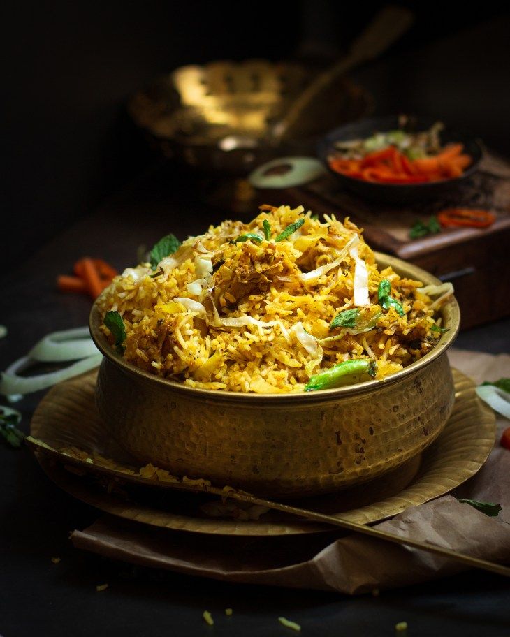 a large bowl filled with food on top of a table