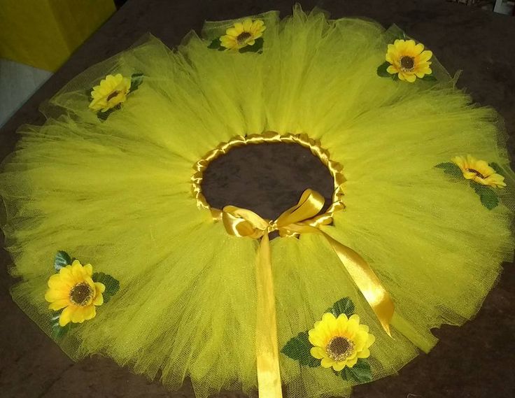 a yellow tutu with sunflowers on it