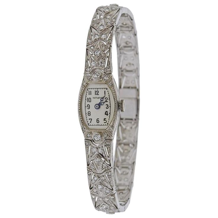 Art Deco 18k white gold watch bracelet, adorned with approx. 1.60ctw in diamonds (one stone is missing). Watch has manual wind movement, in running order. Dial signed "Initiative". Bracelet is 7 1/8" long, case is 14mm excl. crown x 25mm. Weighs 24.9 grams. White Gold Watch, Gold Diamond Watch, Gold Diamond Watches, Art Deco Watch, Wind Movement, Art Deco Gold, Watch Bracelet, Diamond Watch, Watches Jewelry