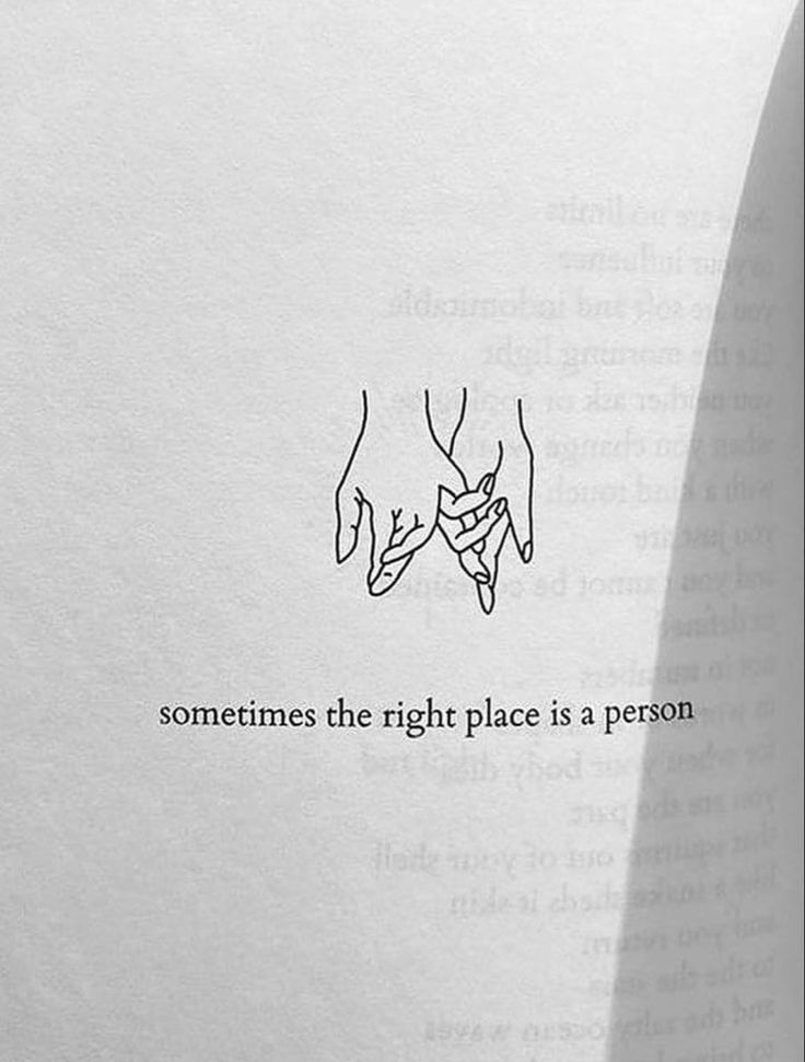 someone's hand holding another persons hand with the words sometimes the right place is a person