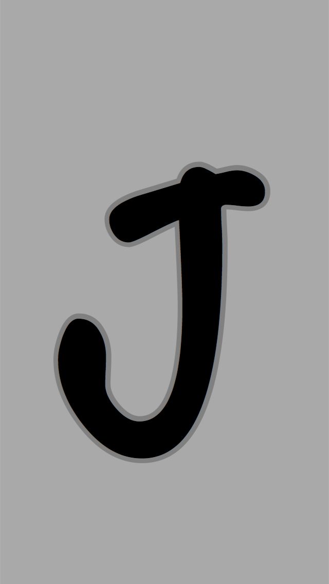 the letter t is shown in black on a gray background