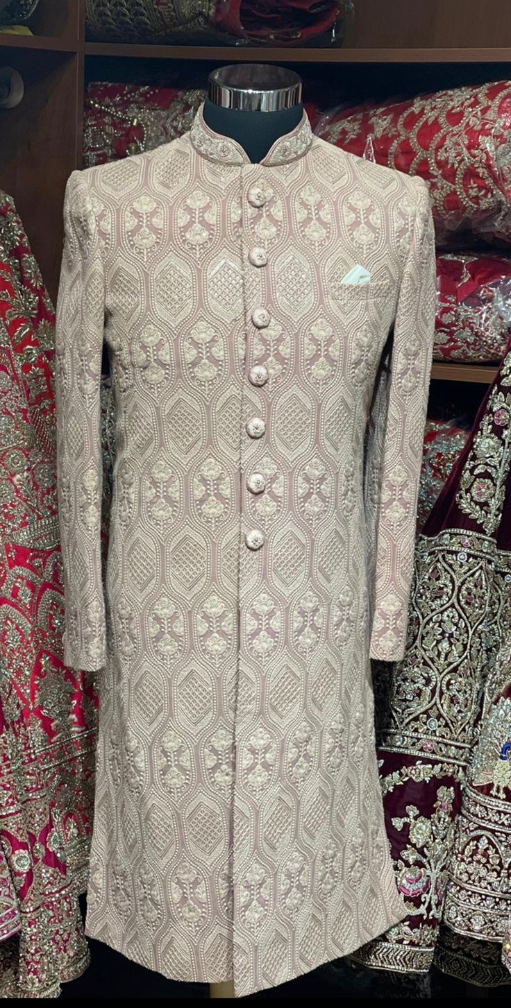 Sienna brown excellent detailing of vintage motifs accentuated with thread and sequence details with mandarin collar in cut dana and zardozi work. Available with matching churidar. Size: 38,44 Ready to Ship! Traditional Beige Unstitched Suit For Formal Occasions, Fitted Jamawar Anarkali Set With Dabka, Traditional Brown Wear For Diwali, Festive Brown Raw Silk Traditional Wear, Traditional Brown Wear With Pallu, Brown Zari Work Set For Diwali, Traditional Brown Wear With Traditional Drape, Brown Raw Silk Traditional Wedding Wear, Festive Semi-stitched Brown Traditional Wear