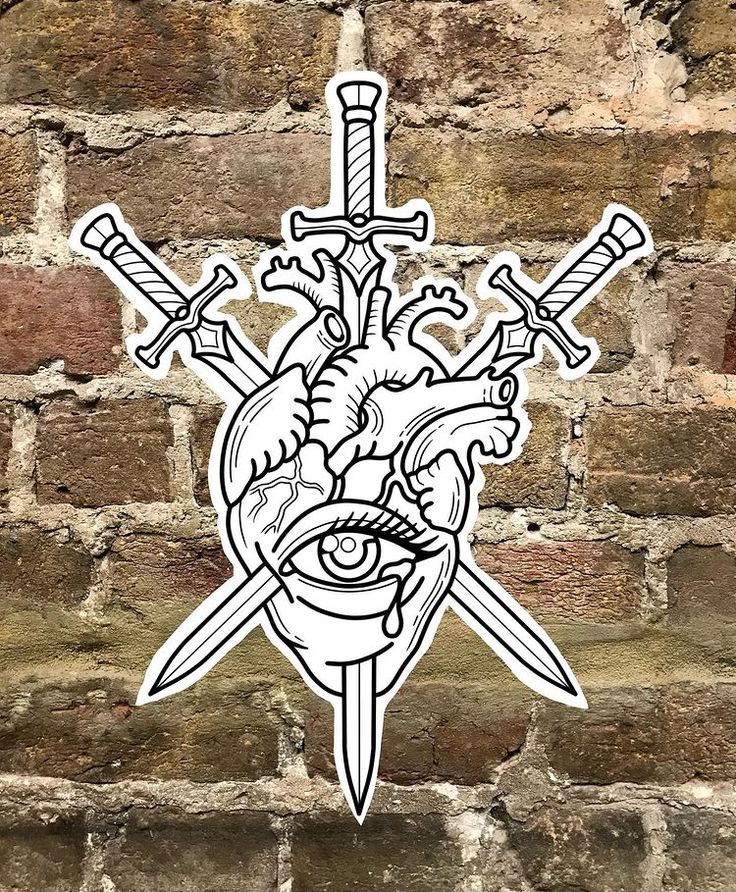 a sticker on the side of a brick wall depicting a heart and two swords